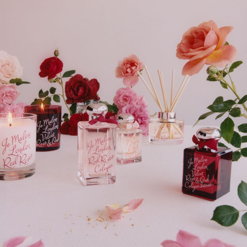 Elegant display of Jo Malone Rose & Co. fragrances with roses and diffusers at Victoria Leeds.