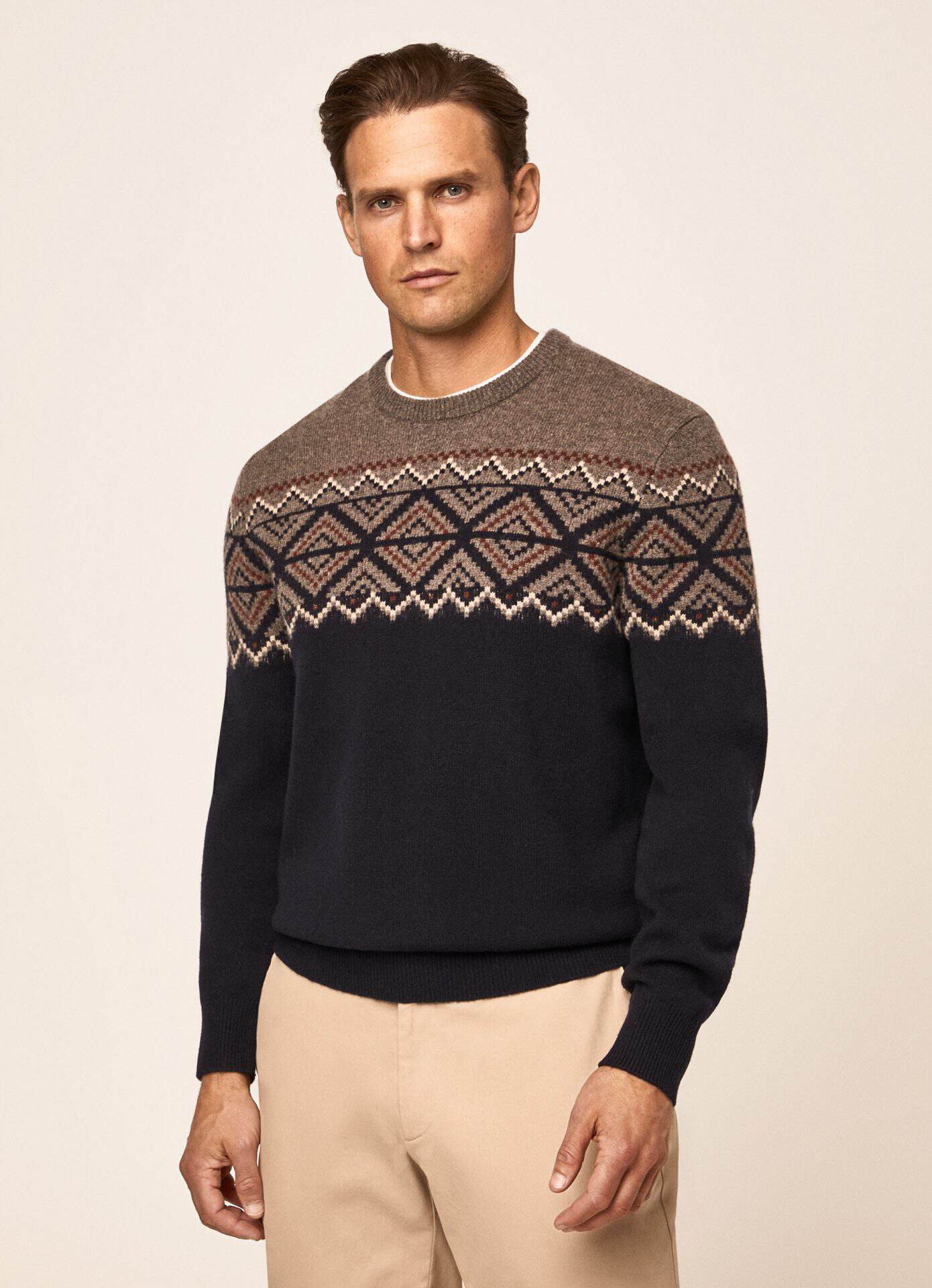 Men's knitted sweater with festive Fair Isle pattern, perfect for Christmas gifting.