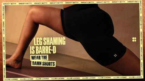 Woman performing leg exercise in black shorts at Victoria Leeds.