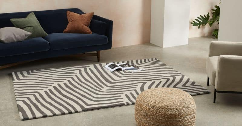 Stylish Leeds living room with contemporary furniture and a patterned rug.