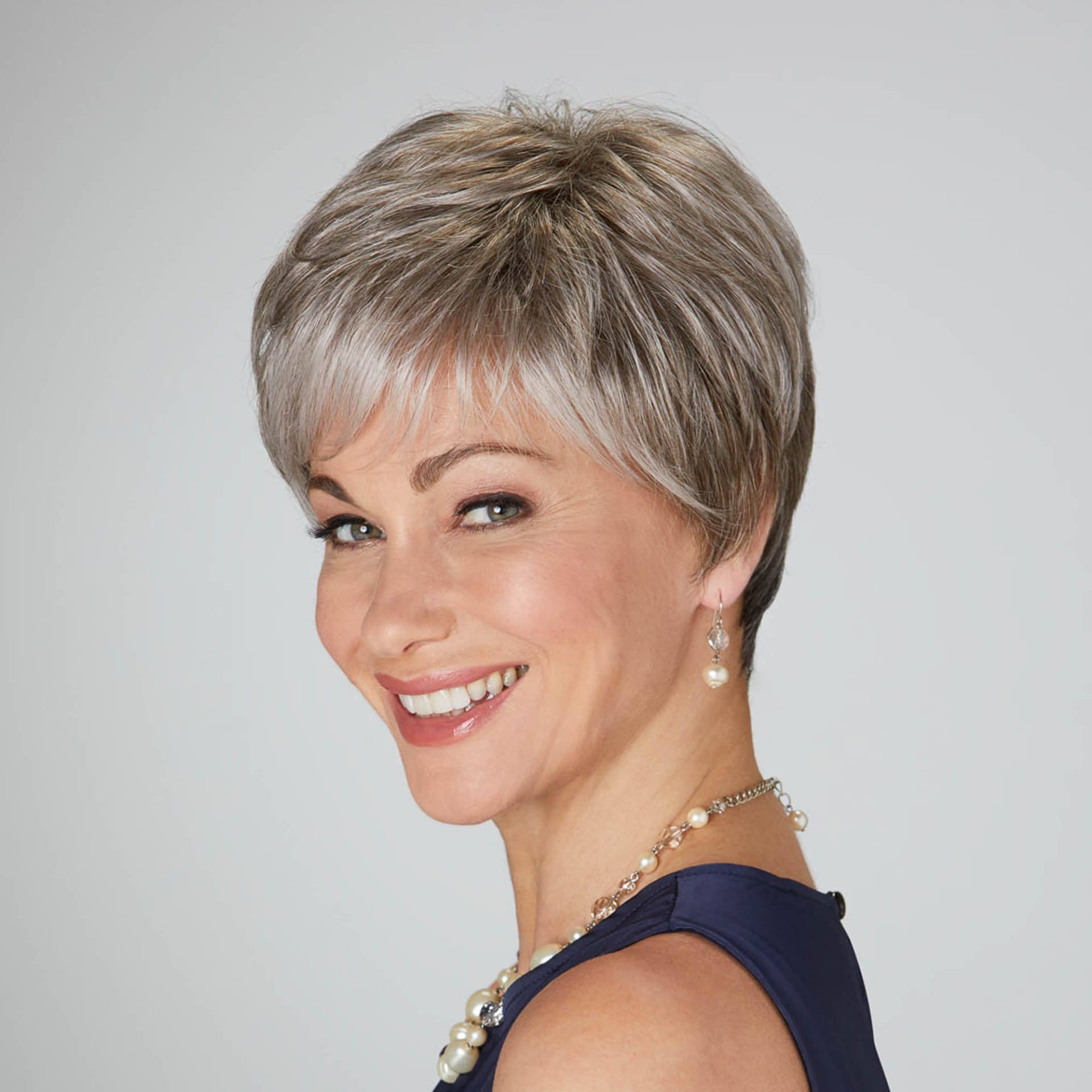 Stylish short grey hair with layered cut, perfect for a sophisticated look.