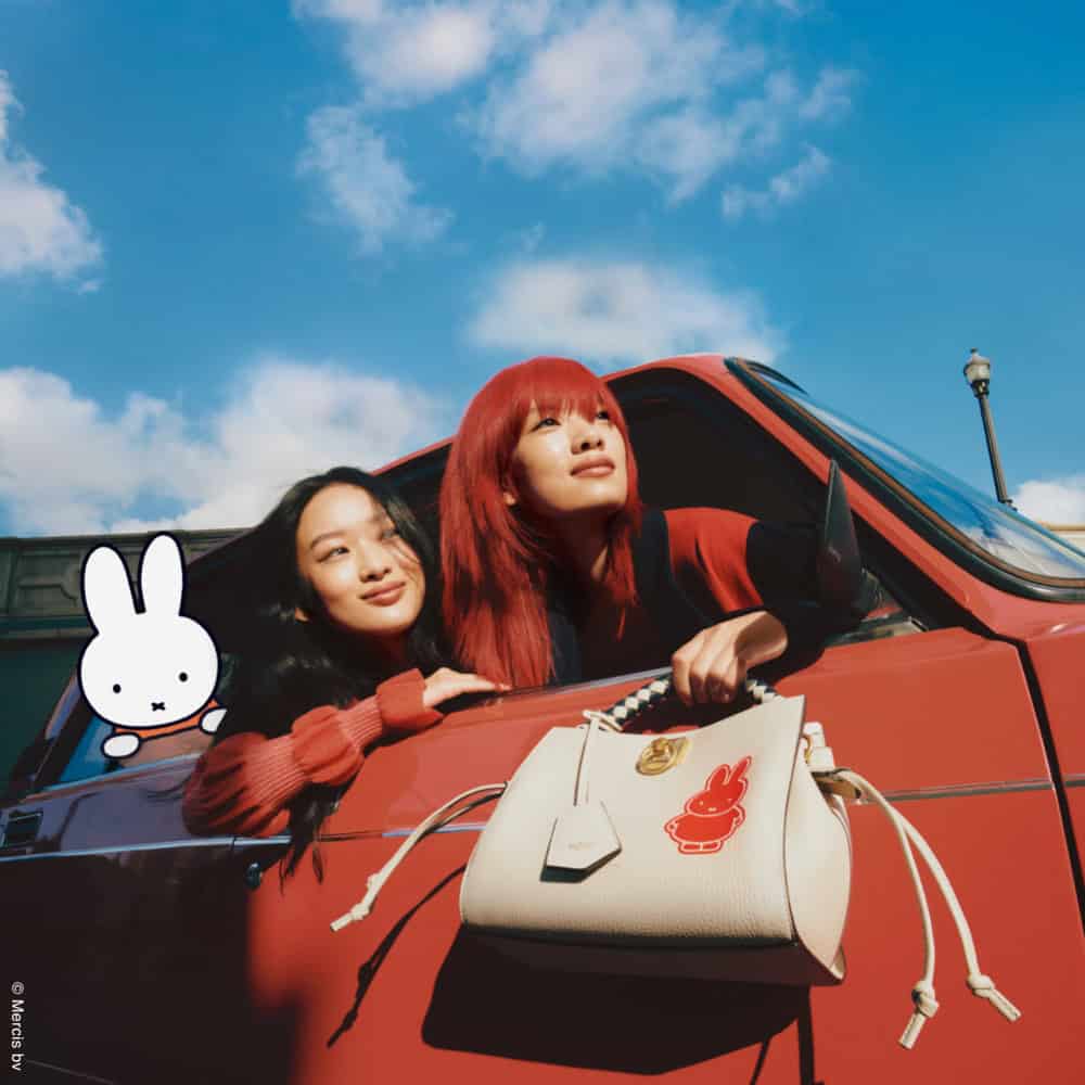 Stylish women with Mulberry bags at Victoria Leeds shopping centre.