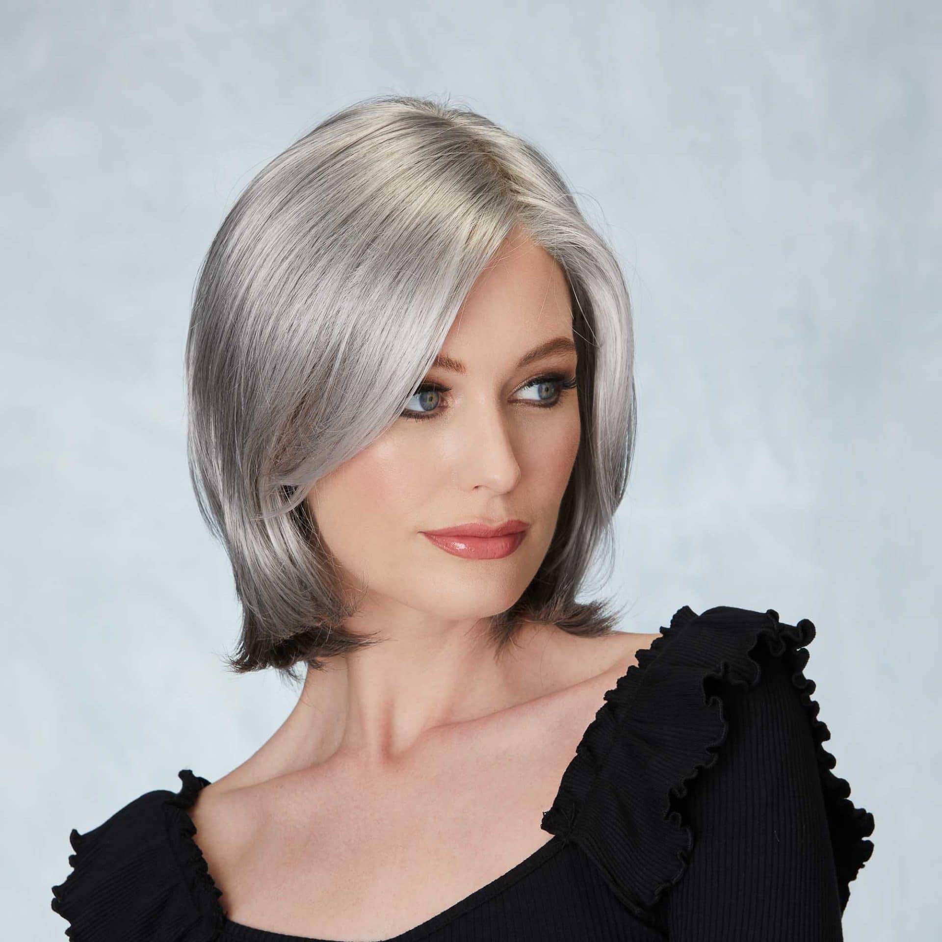 Woman with silver hair and soft waves at Victoria Leeds.