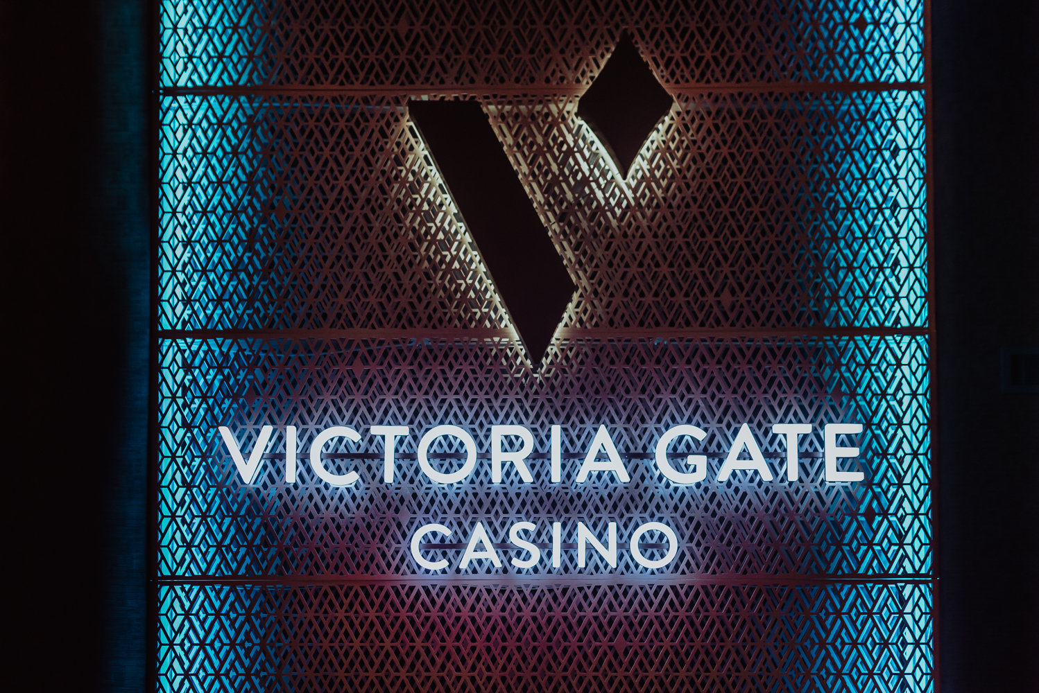 Victoria Leeds casino sign illuminated with neon lights in Leeds.