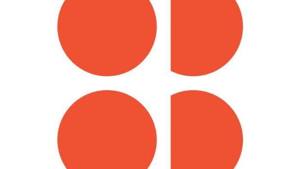 Abstract geometric art with orange circles and shapes at Victoria Leeds shopping centre.