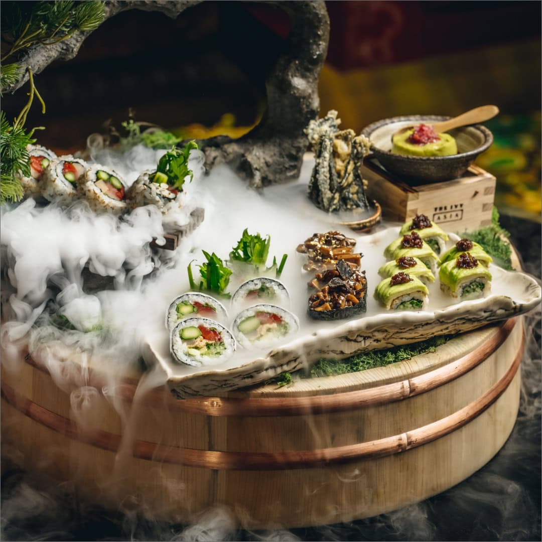 Elegant sushi platter with fresh rolls and garnishes at Victoria Leeds.