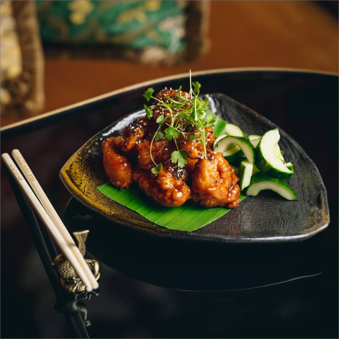 Delicious Asian-style chicken with fresh cucumber garnish at Victoria Leeds.