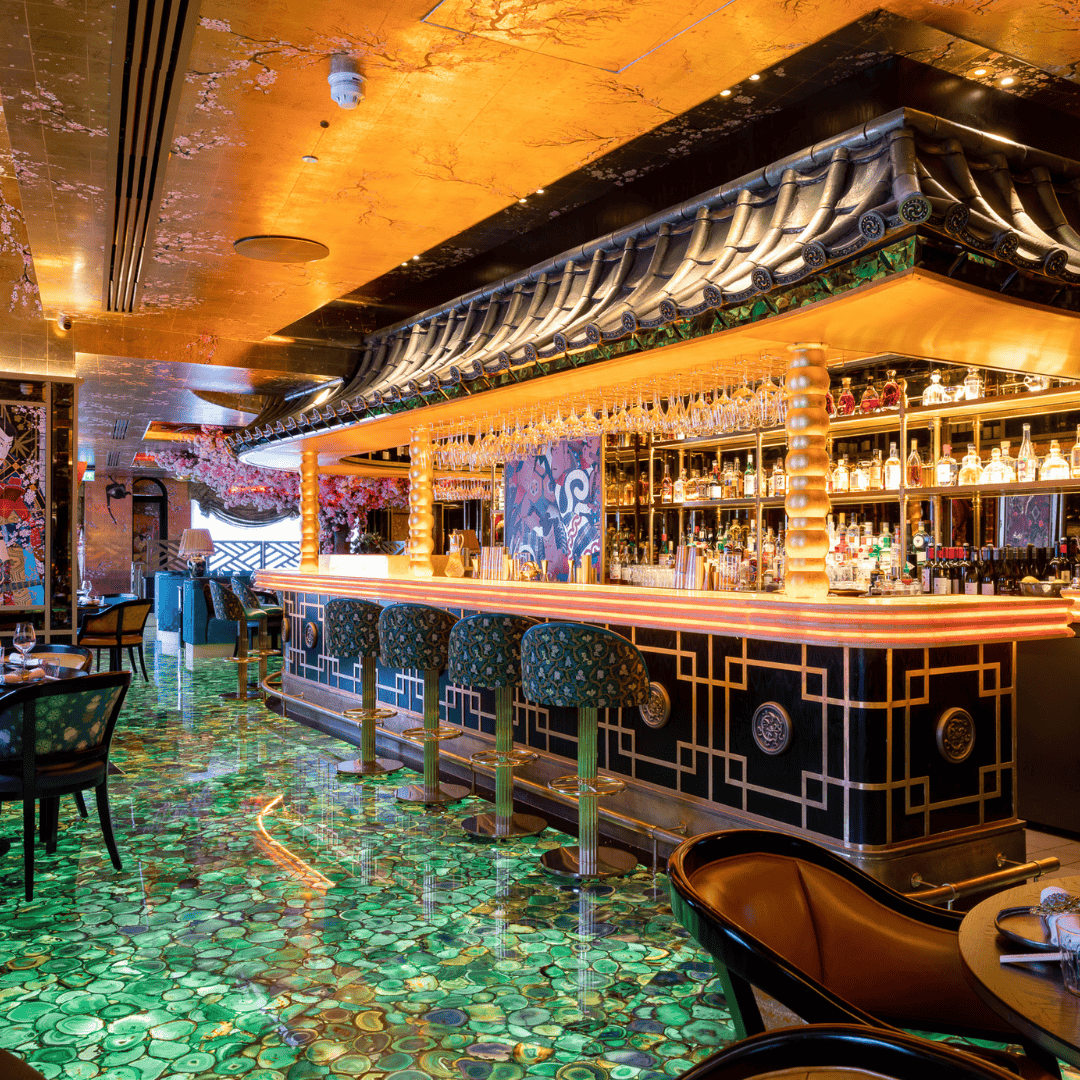 Elegant bar interior at Victoria Leeds with Asian-inspired decor and ambient lighting.