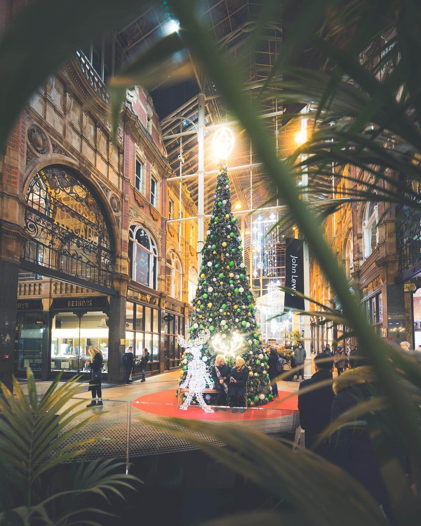 Festive Christmas tree display at Victoria Leeds shopping centre during the holiday season.