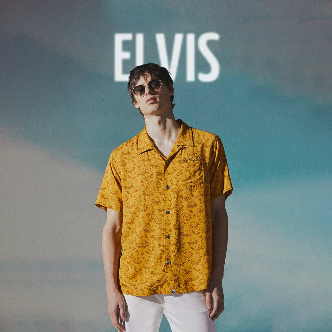 Elvis-inspired yellow floral shirt at Victoria Leeds for PRETTY GREEN X ELVIS collaboration.
