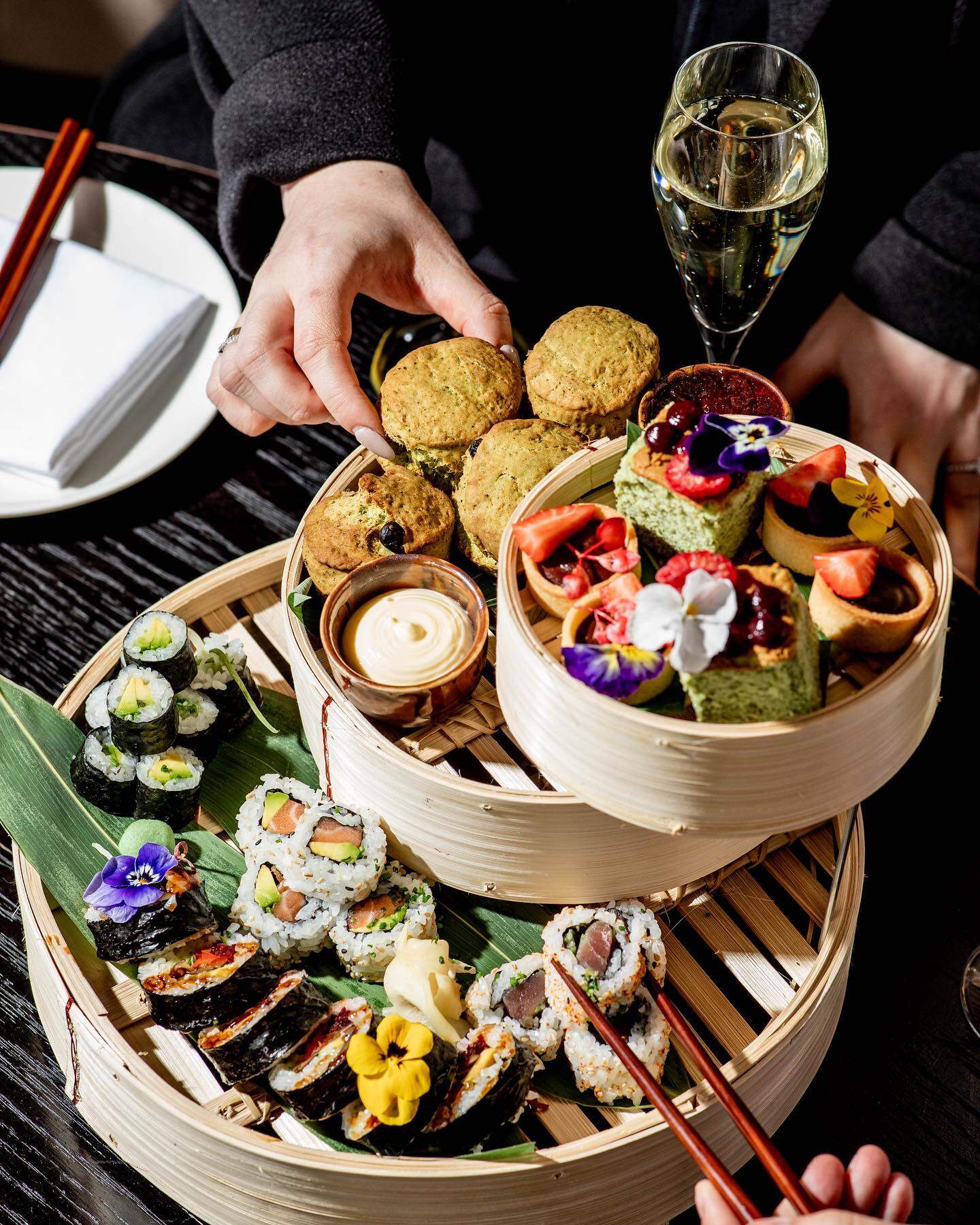 Delicious assortment of sushi, desserts, and finger foods at Victoria Leeds for summer dining.