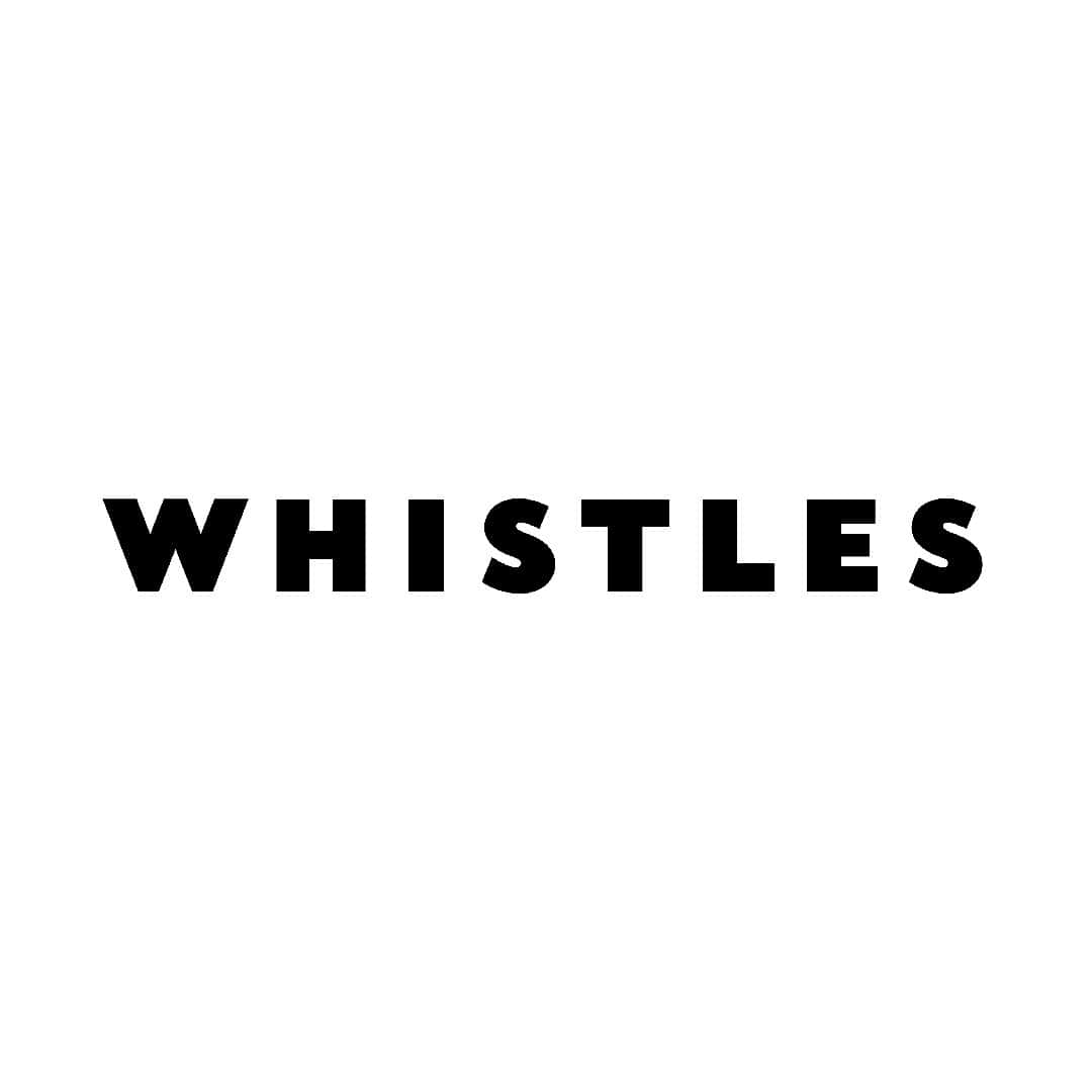 Whistles logo displayed at Victoria Leeds shopping centre in Leeds, UK.