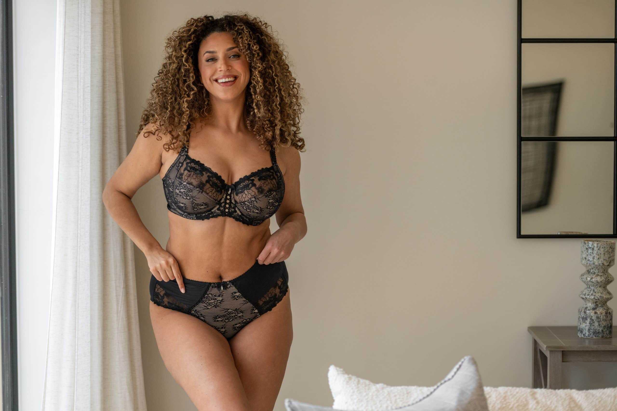 Elegant black lace lingerie set featuring intricate detailing, perfect for confident and stylish wom.