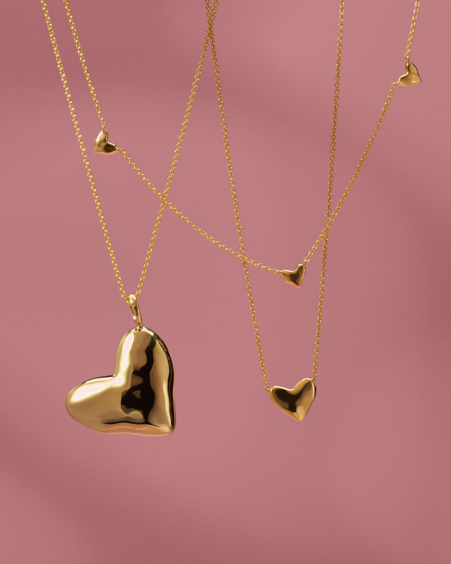 Elegant gold heart pendant necklace for self-love and romantic presents.