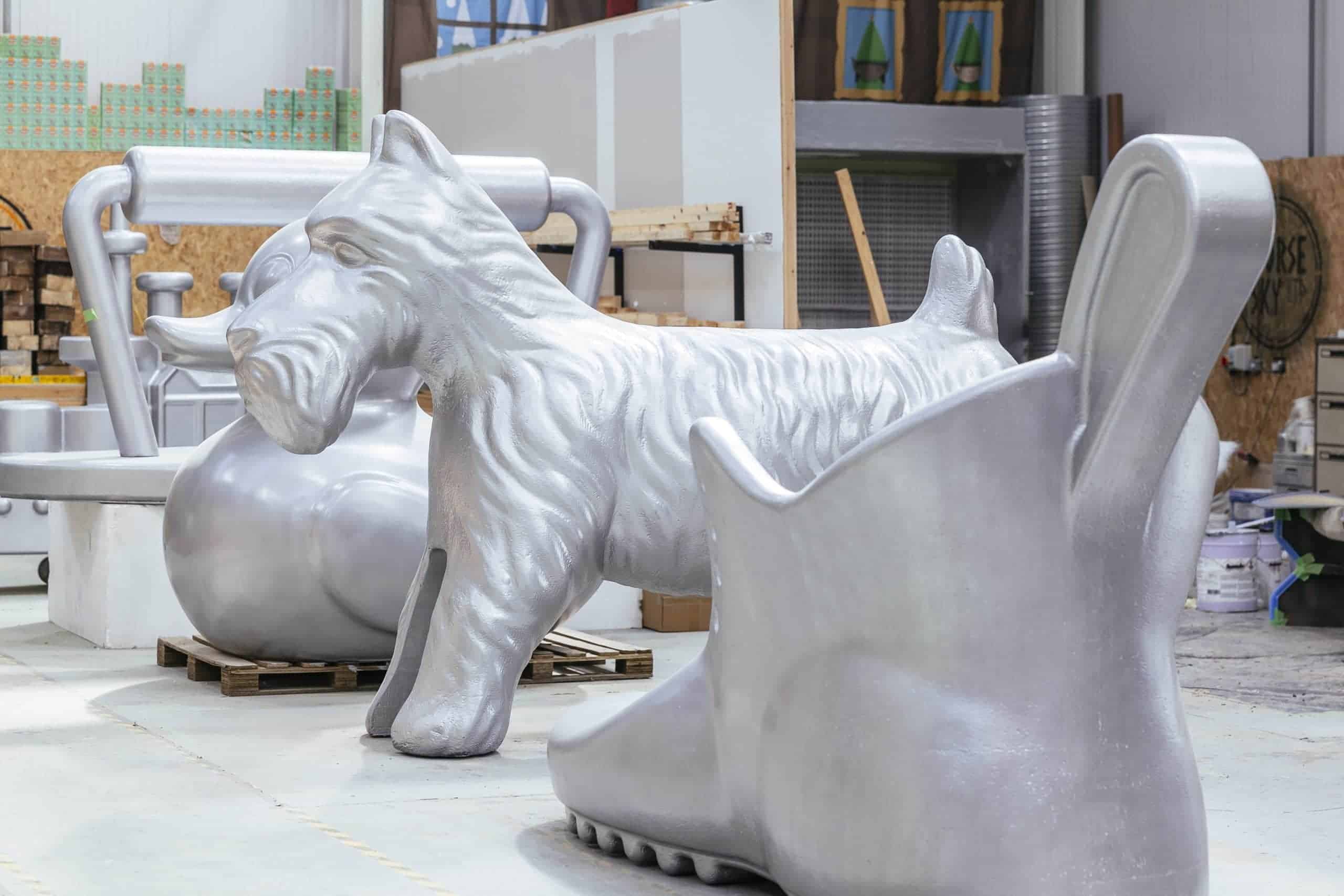 Large silver Monopoly-themed sculpture in Victoria Leeds shopping centre.