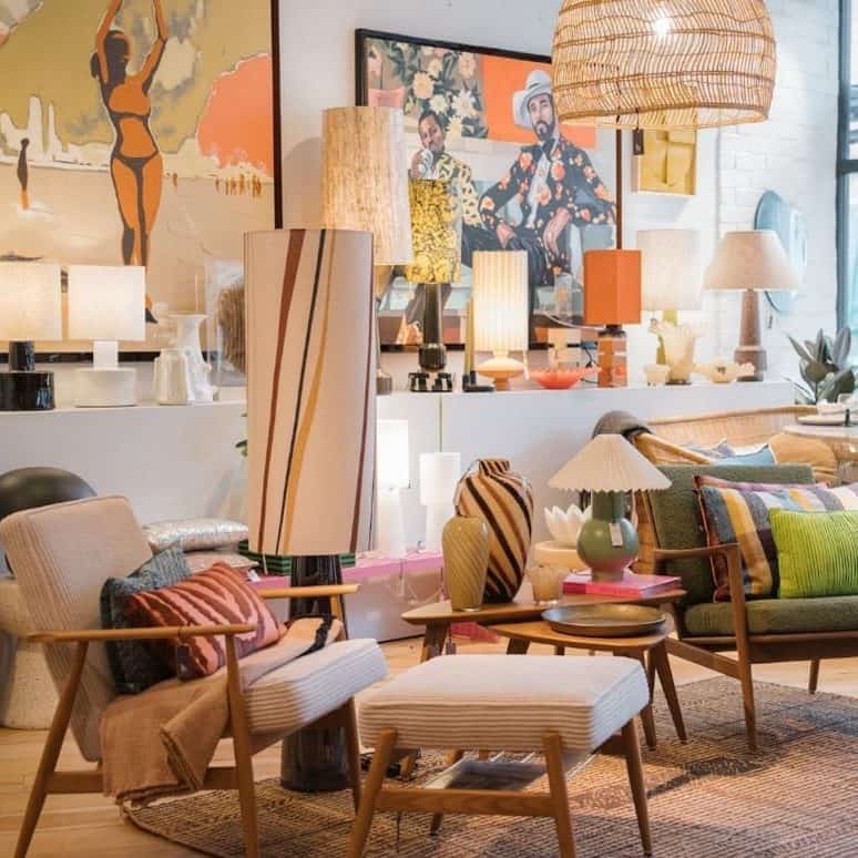 Brightly lit interior showcasing contemporary Nordic homeware and furniture pieces.
