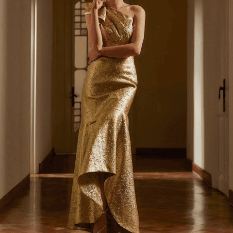 Elegant gold evening gown perfect for New Year's Eve celebrations and festive parties.