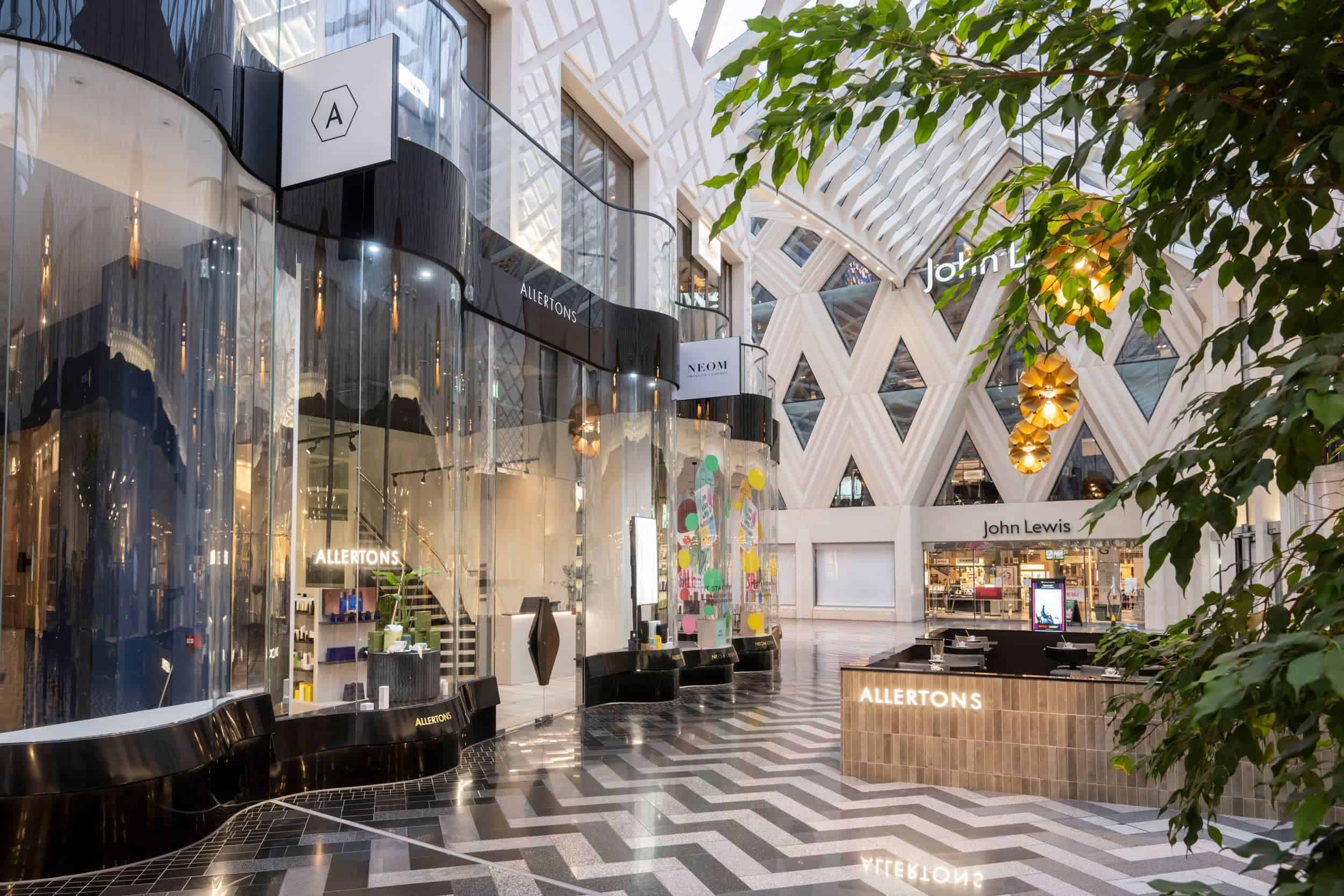 Victoria Leeds shopping centre interior showcasing contemporary design, retail stores, and a relaxin.