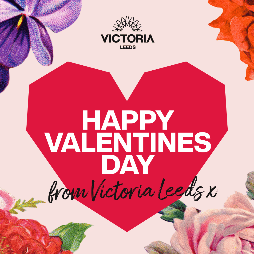 Victoria Leeds Valentine's Day celebration with floral decorations and festive heart design.