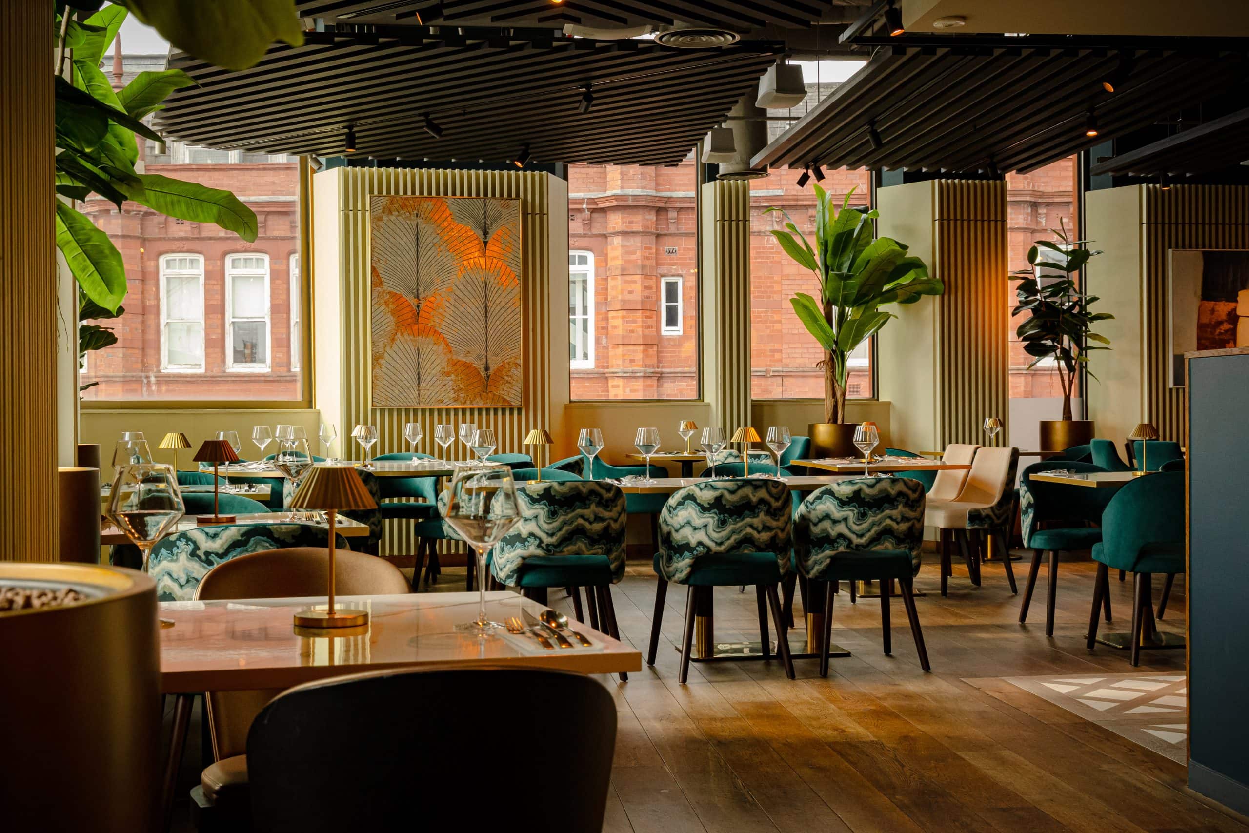Stylish restaurant interior at Victoria Leeds featuring modern decor, comfortable seating, and vibra.