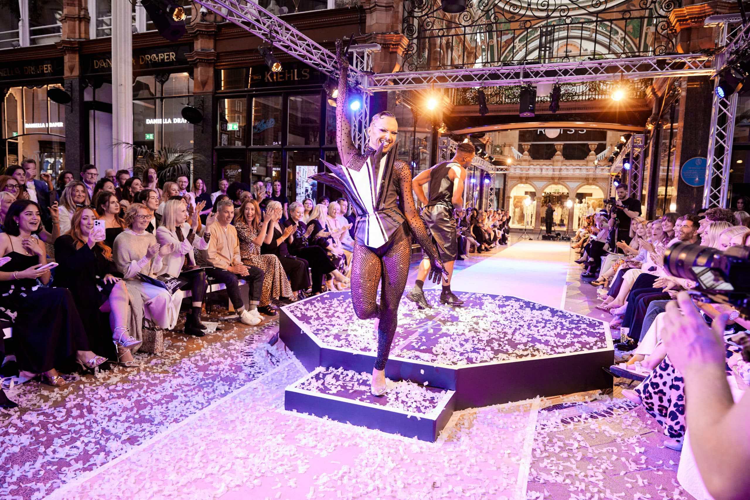 Fashion show at Victoria Leeds shopping centre with models showcasing latest trends.