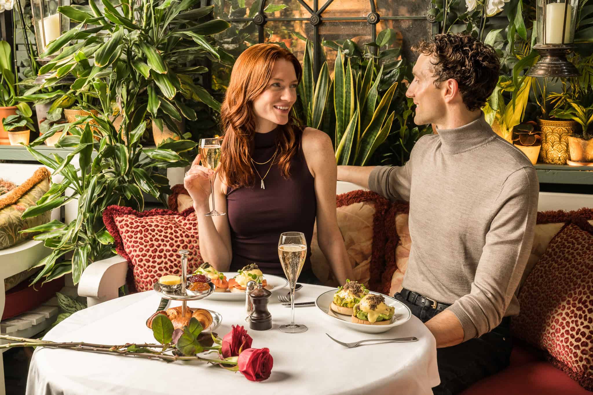 Elegant dining at Victoria Leeds with a romantic atmosphere and lush greenery.