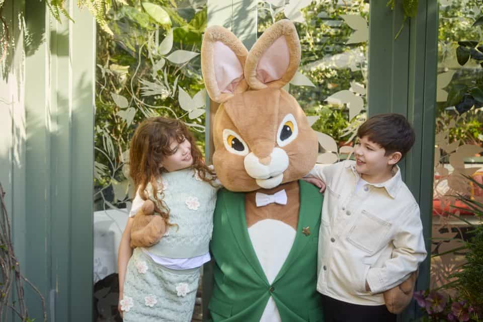 Children with The Ivy Bunny mascot at Victoria Leeds during Easter event.