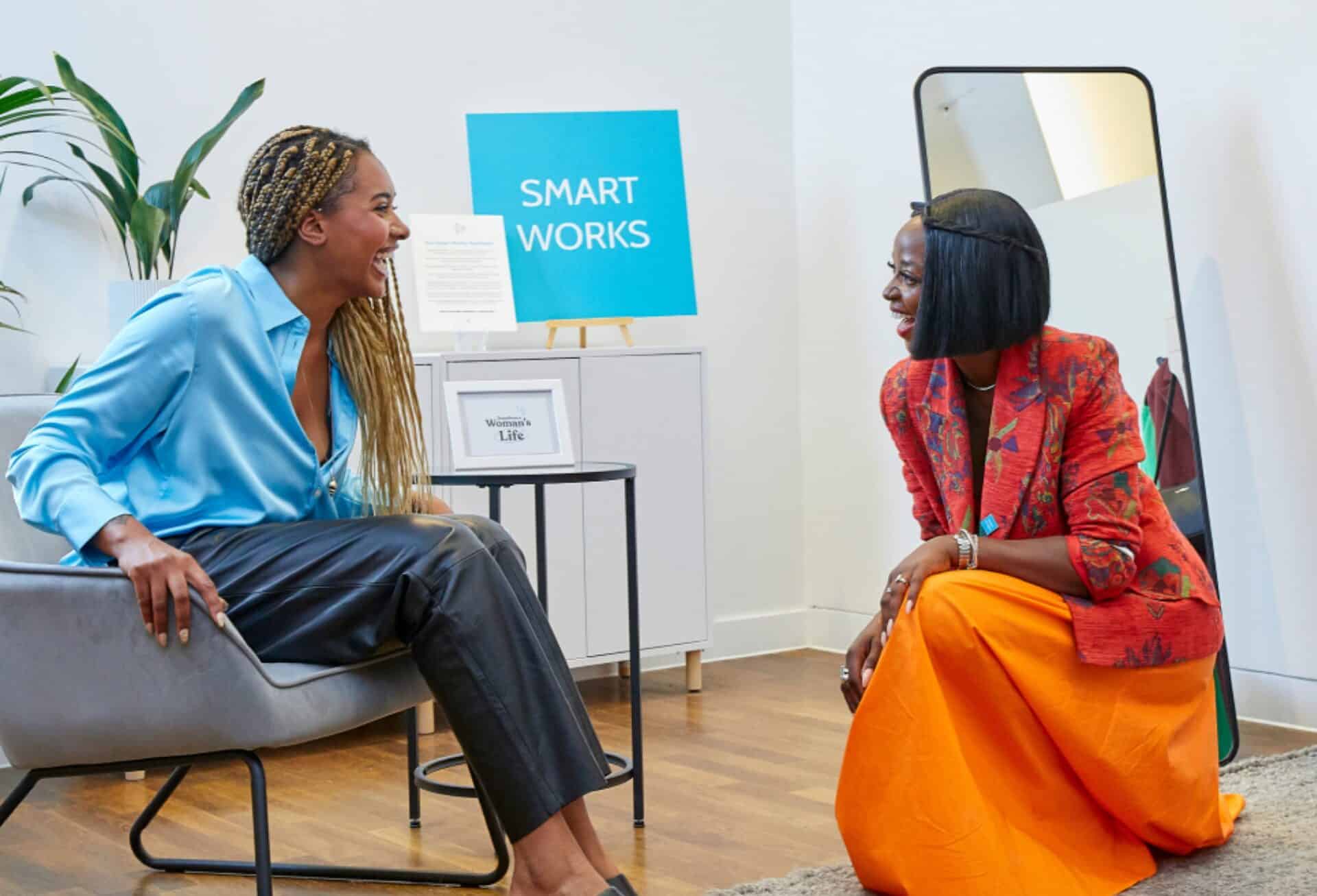 Elegant women discussing fashion at Victoria Leeds during Fashion Week 2026.