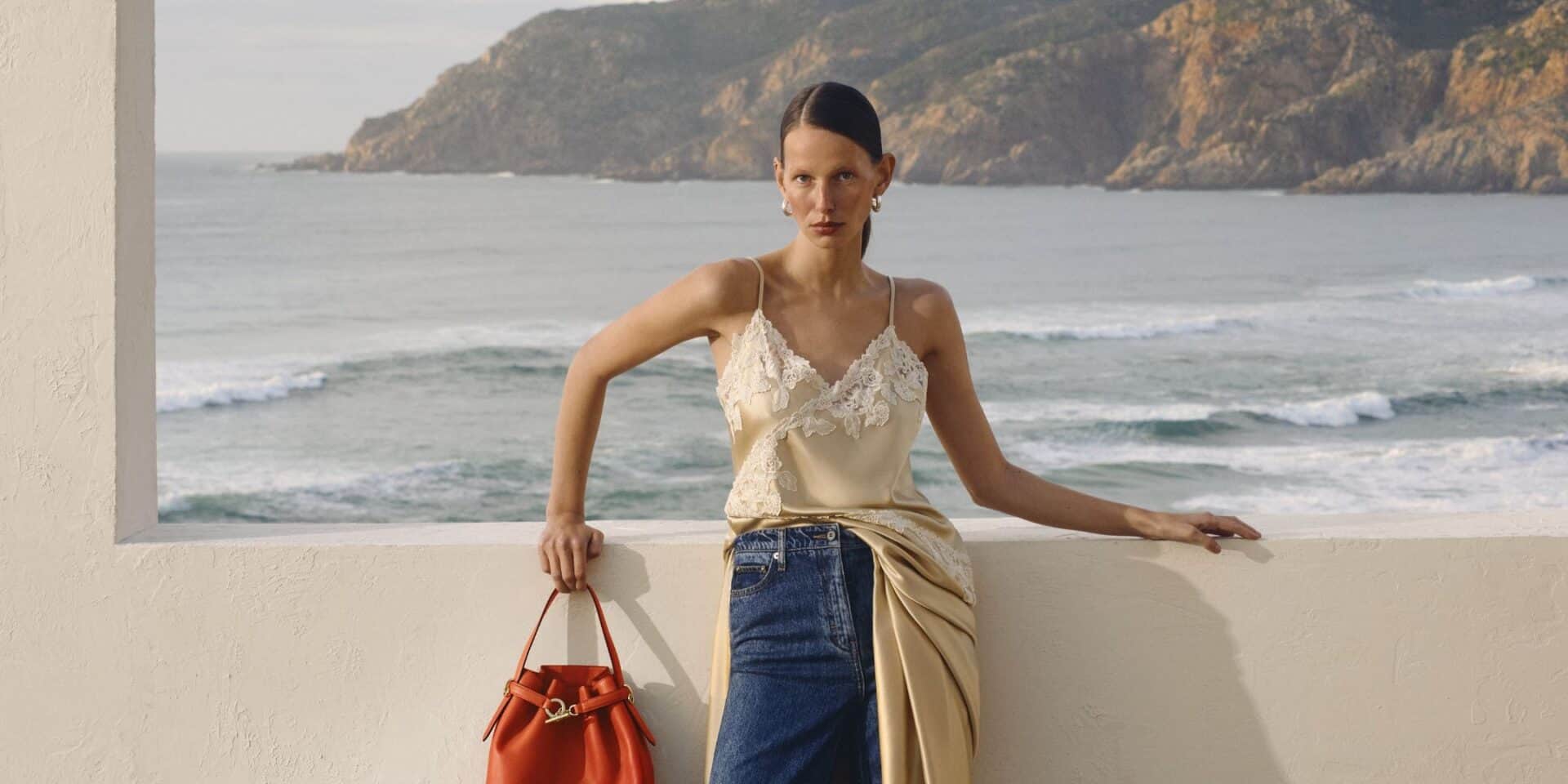 Elegant woman in summer dress at Victoria Leeds, showcasing exclusive fashion offers.