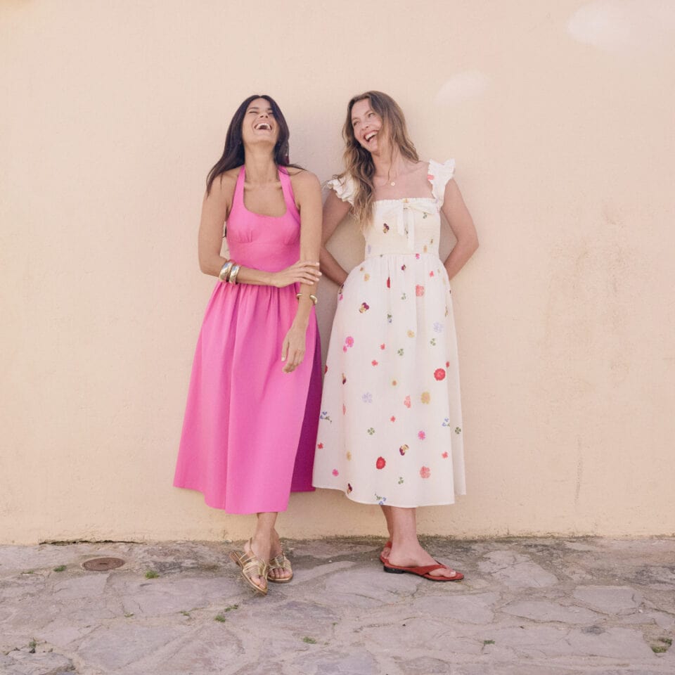 Victoria Leeds Fashion Week event featuring stylish women in vibrant summer dresses.