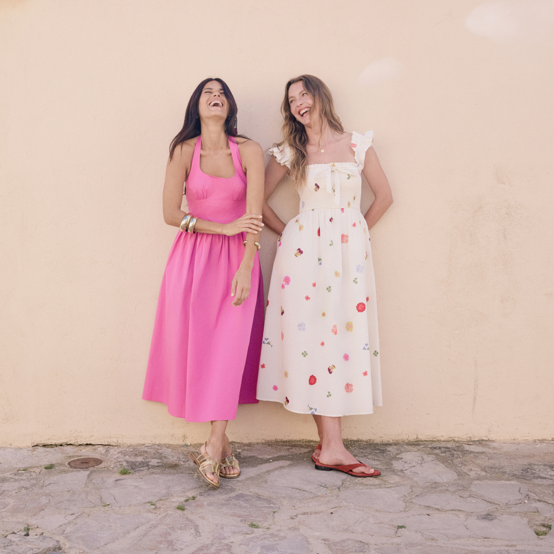 Victoria Leeds Fashion Week event featuring stylish women in vibrant summer dresses.