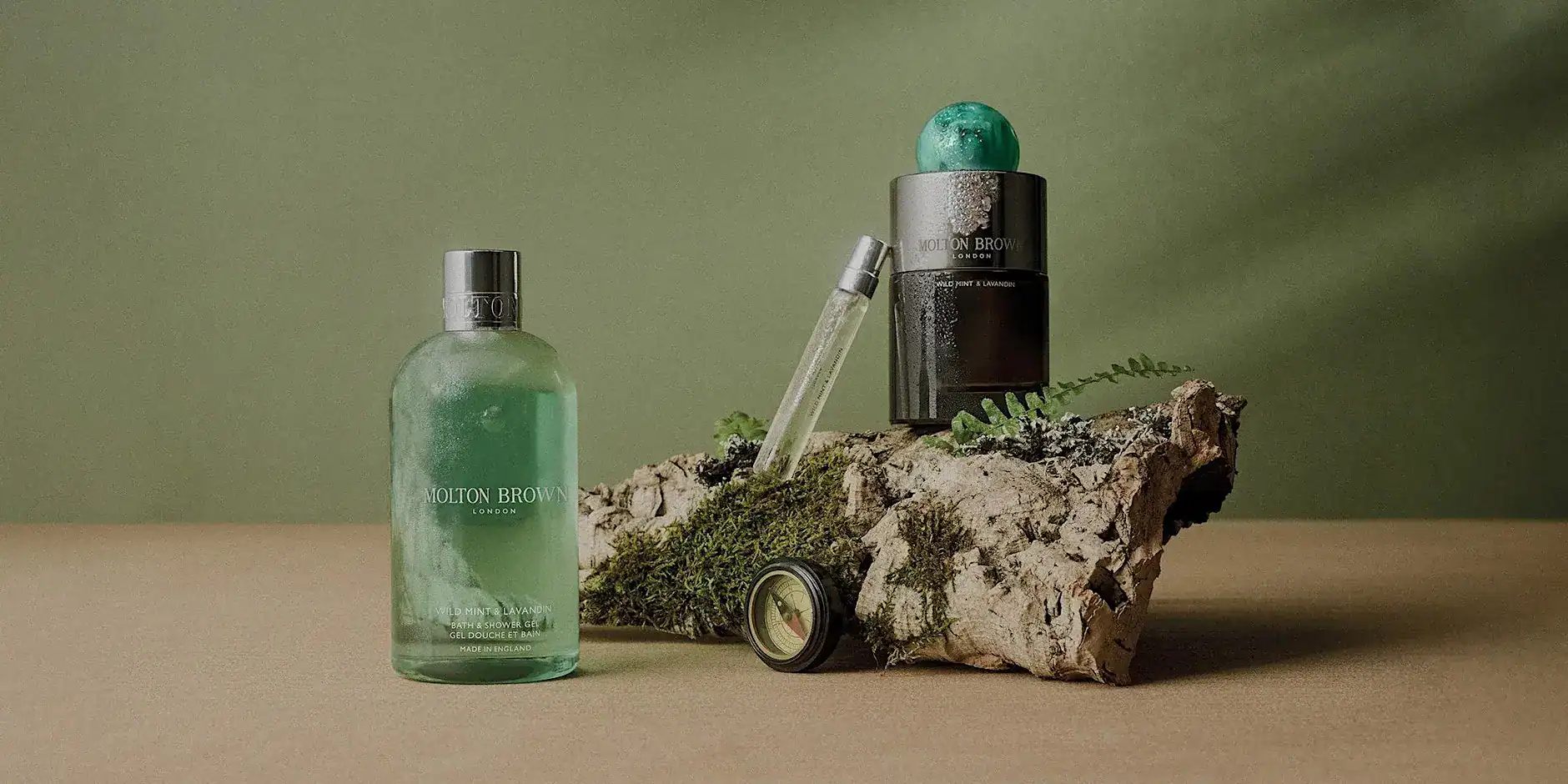 Luxury skincare products displayed on natural wood with green background at Victoria Leeds.