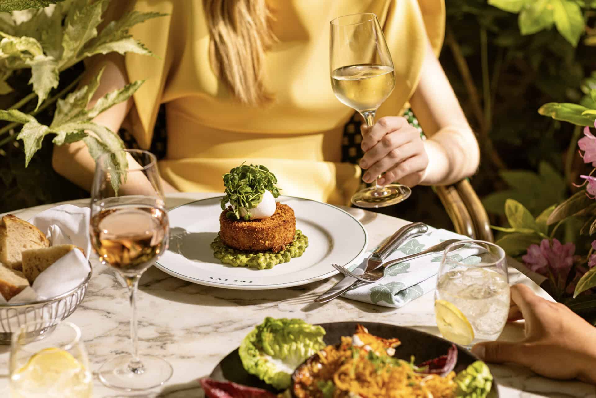 Elegant dining at Victoria Leeds with gourmet dishes and wine.