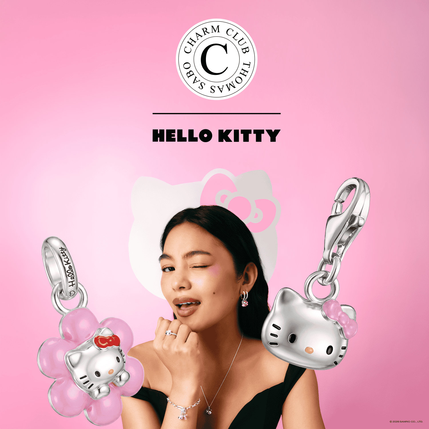 Hello Kitty charm with pink flower and silver details for jewellery.